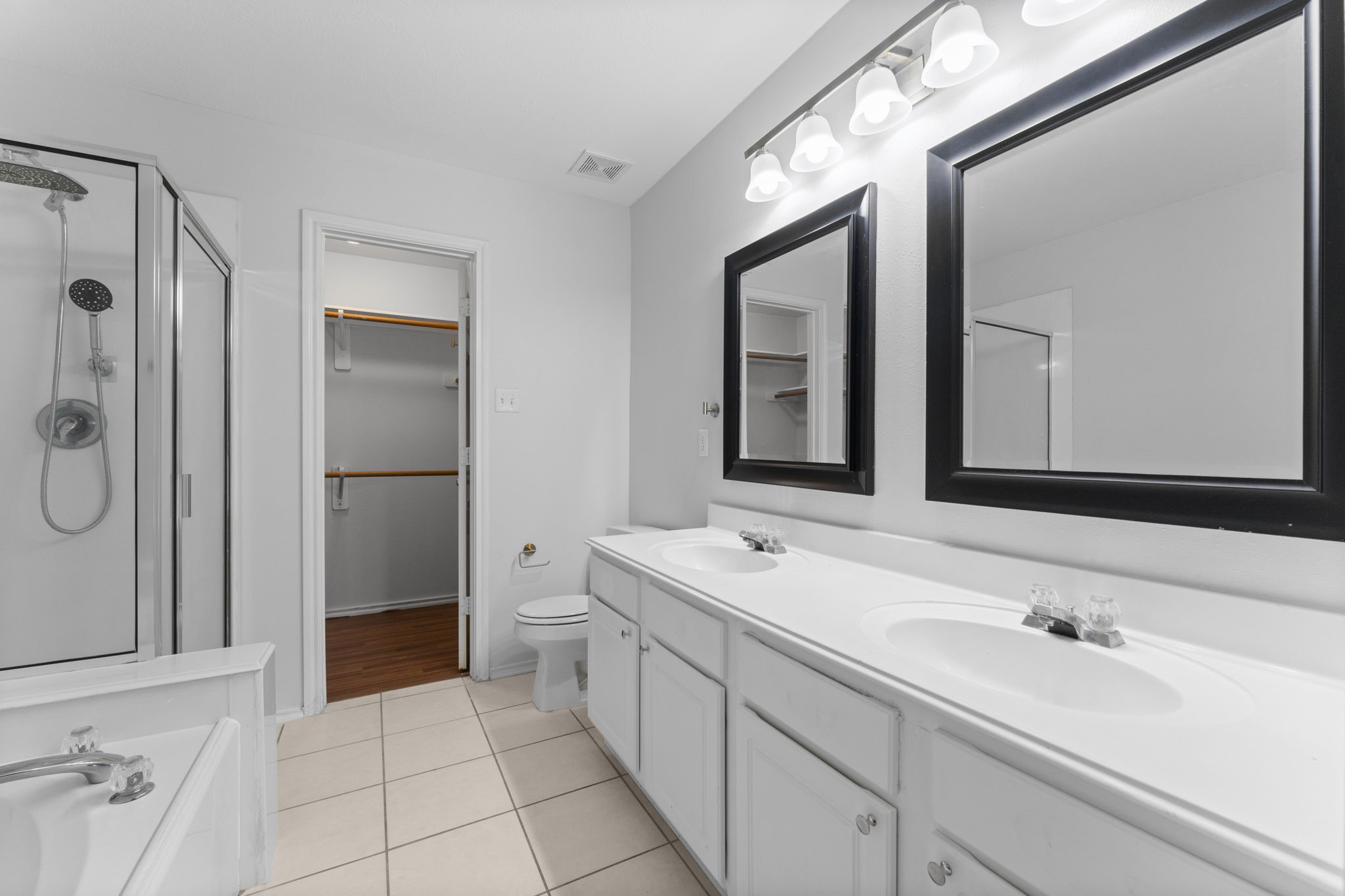 15 Timberstar Street Spring, TX 77382 - Photo 15 of 21 a spacious bathroom with a double vanity sink mirror and double