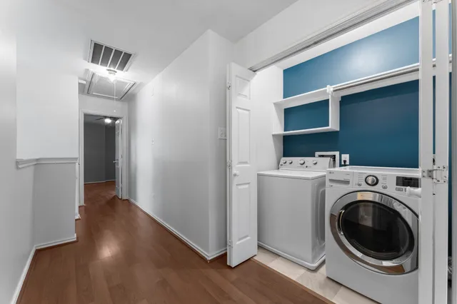 a view of livingroom with washer and dryer