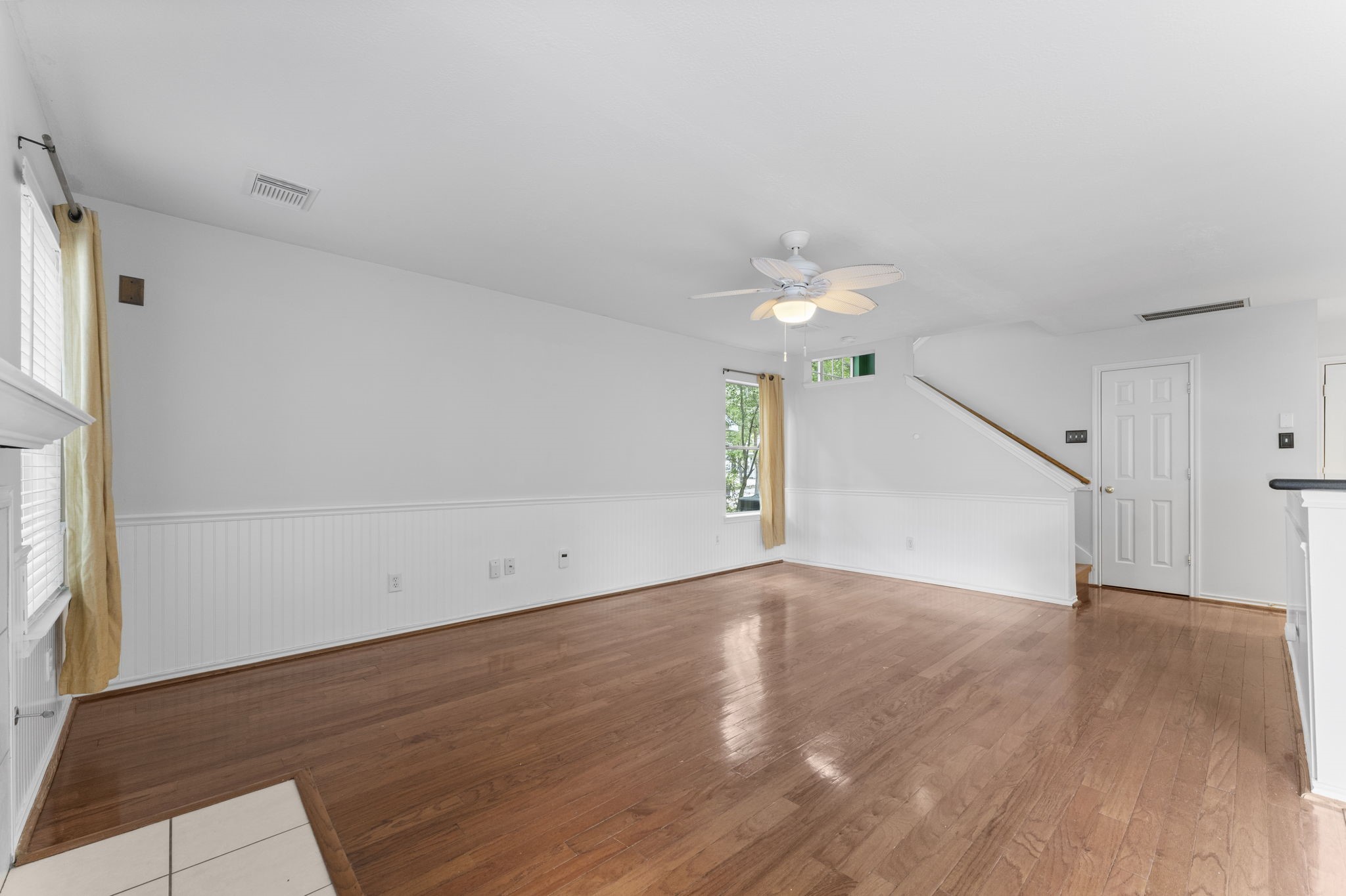 15 Timberstar Street Spring, TX 77382 - Photo 7 of 21 an empty room with wooden floor and windows