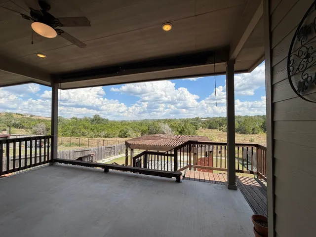 a view of a city street from a balcony