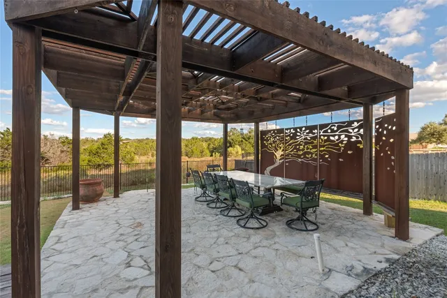 a view of outdoor space with chairs