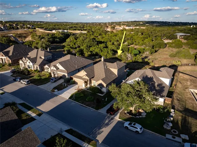 an aerial view of a building with outdoor space