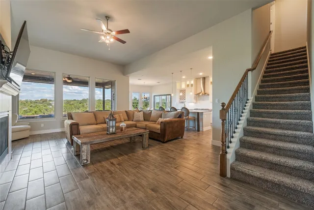 a living room with furniture and a large window