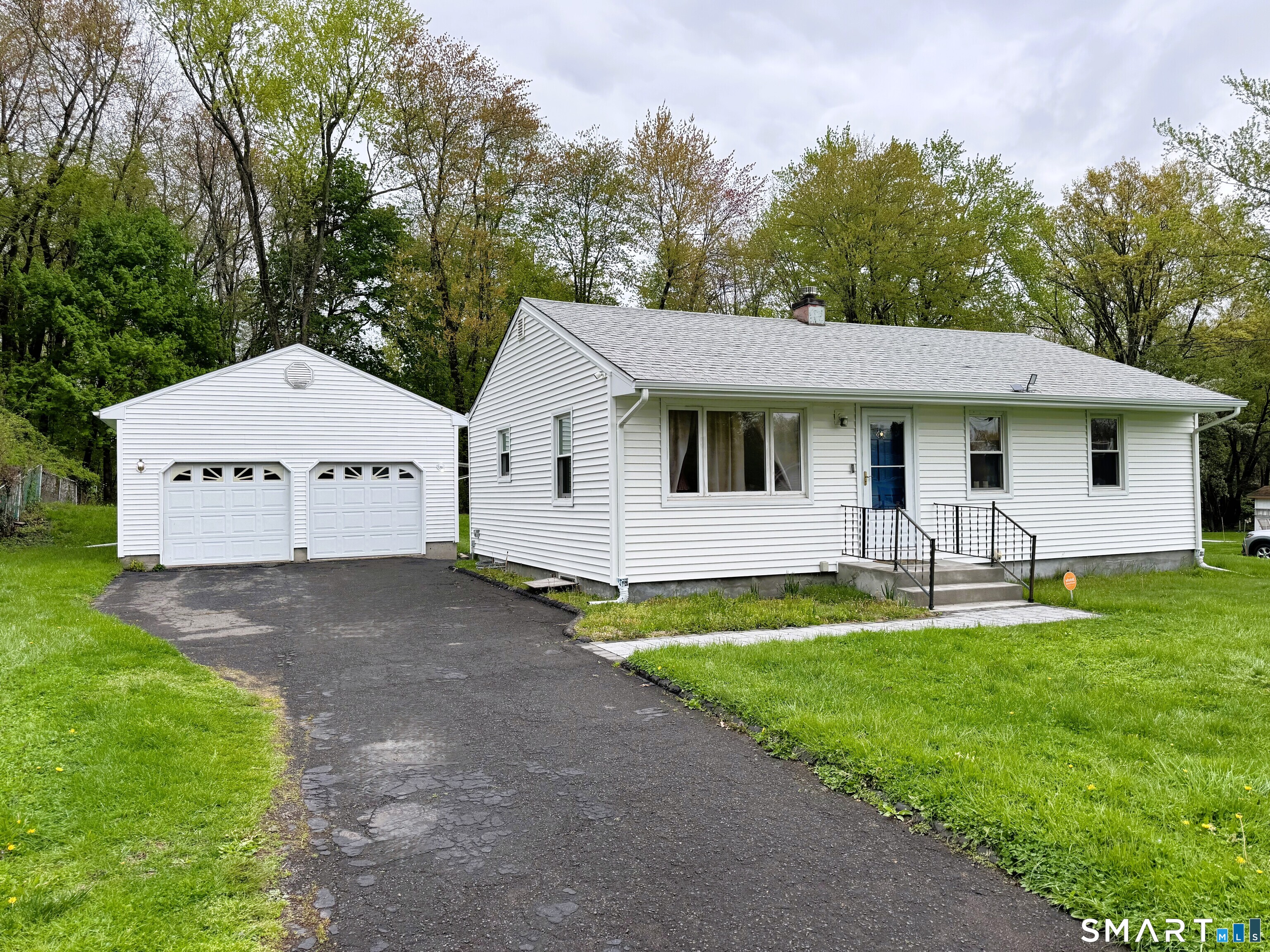 17 Cricket Road East Windsor, CT 06088 - Photo 2 of 40 Front of home and oversized detached 2-car garage