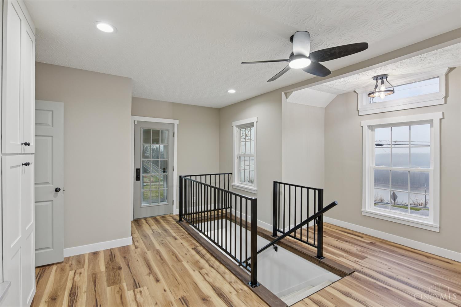 2545 Cliff Road North Bend, OH 45052 - Photo 16 of 55 Open stairwell leads into the spacious lower level that awaits your special touch