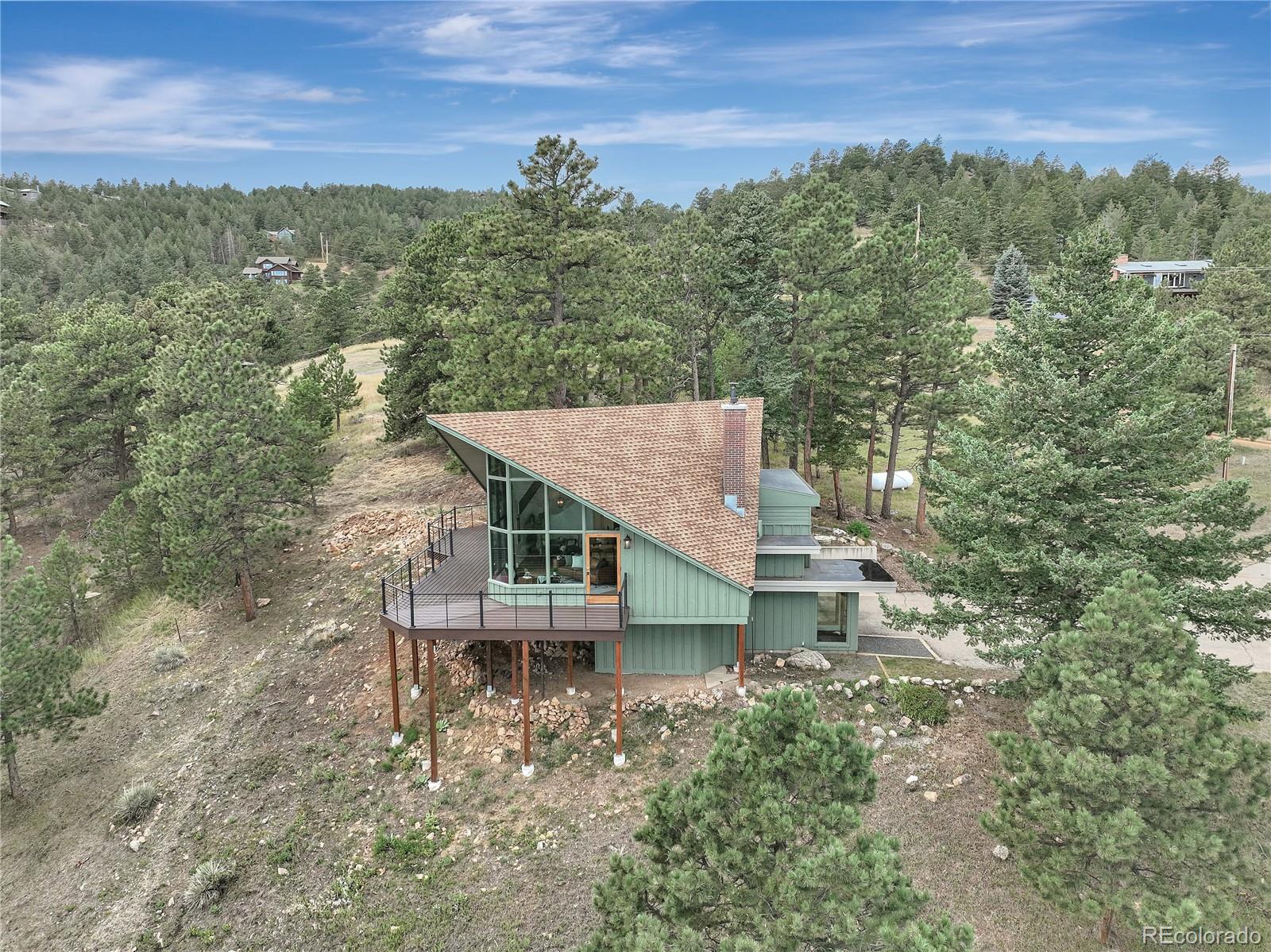 926 Brook Road Boulder, CO 80302 - Photo 3 of 50 an aerial view of a house with a yard