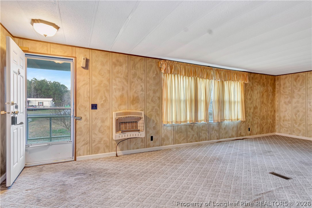 727 Rice Road Lumberton, NC 28358 - Photo 6 of 30 an empty room with windows