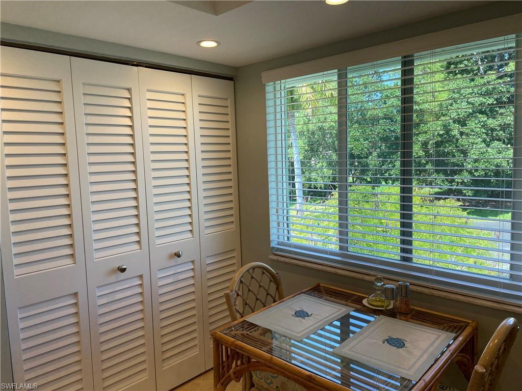 261 Quails Nest Road, Unit 6 Naples, FL 34112 - Photo 14 of 32 a room with a window