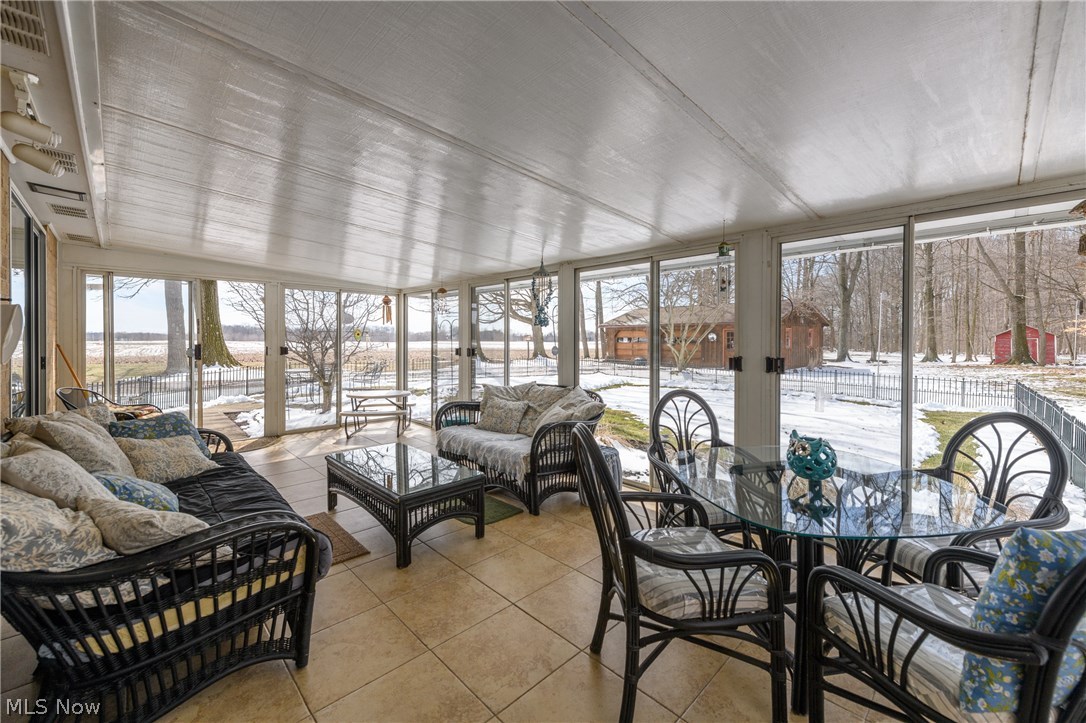 14719 Industry Road Atwater, OH 44201 - Photo 12 of 22 Enclosed patio