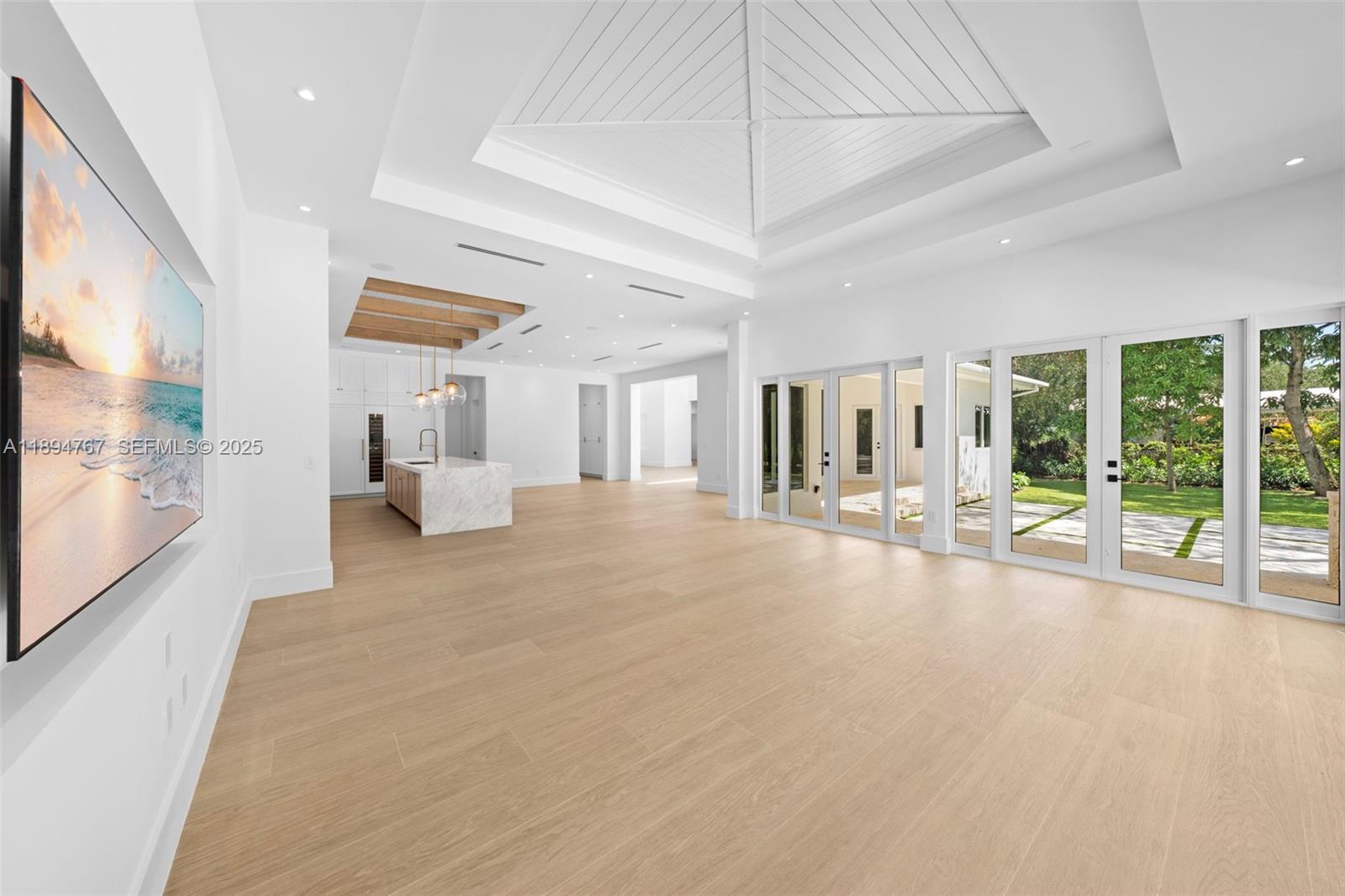 7900 Southwest 118th Street Pinecrest, FL 33156 - Photo 24 of 41 a view of a hall with wooden floor