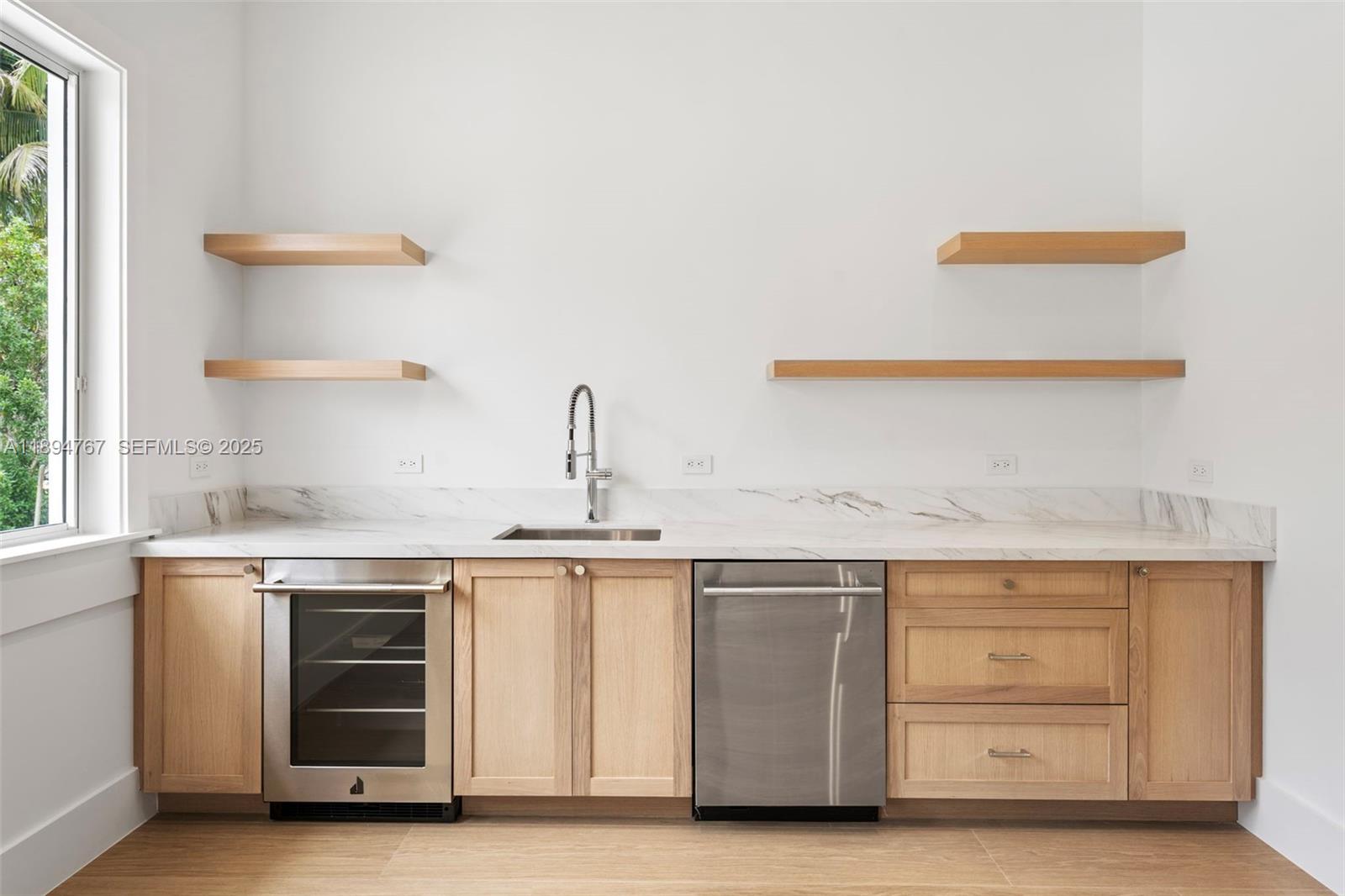 7900 Southwest 118th Street Pinecrest, FL 33156 - Photo 26 of 41 a kitchen with a stove and a sink