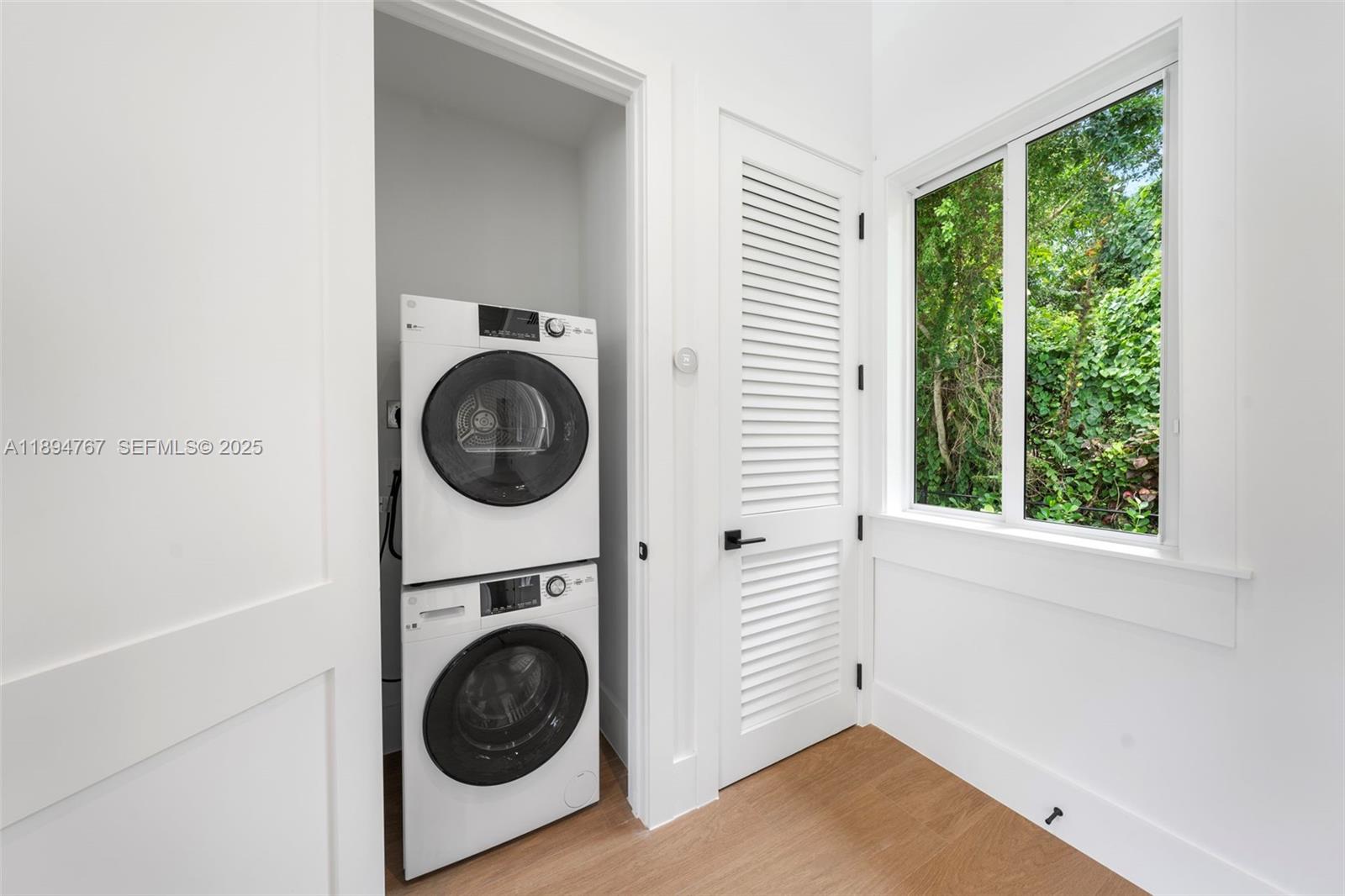 7900 Southwest 118th Street Pinecrest, FL 33156 - Photo 27 of 41 a utility room with sink dryer and washer