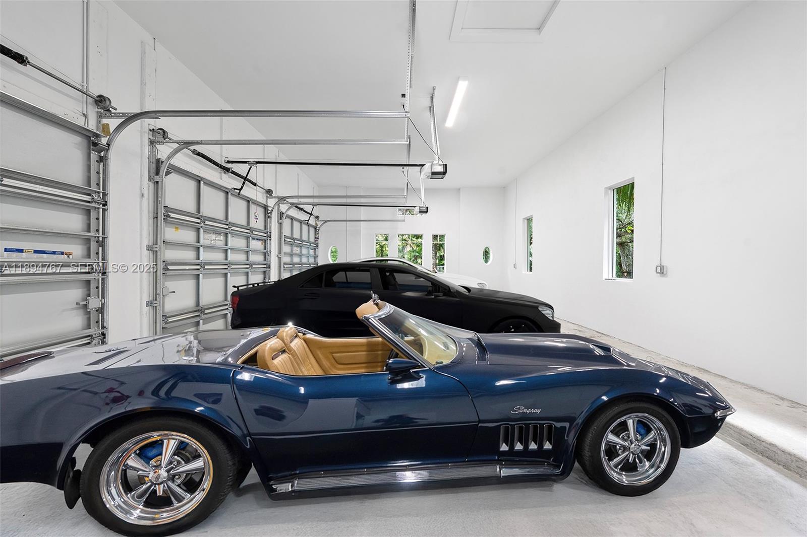 7900 Southwest 118th Street Pinecrest, FL 33156 - Photo 28 of 41 a car parked in a garage