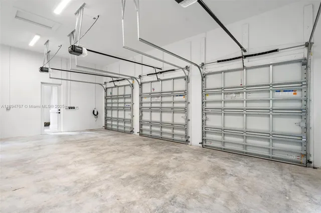 a view of an empty room with windows