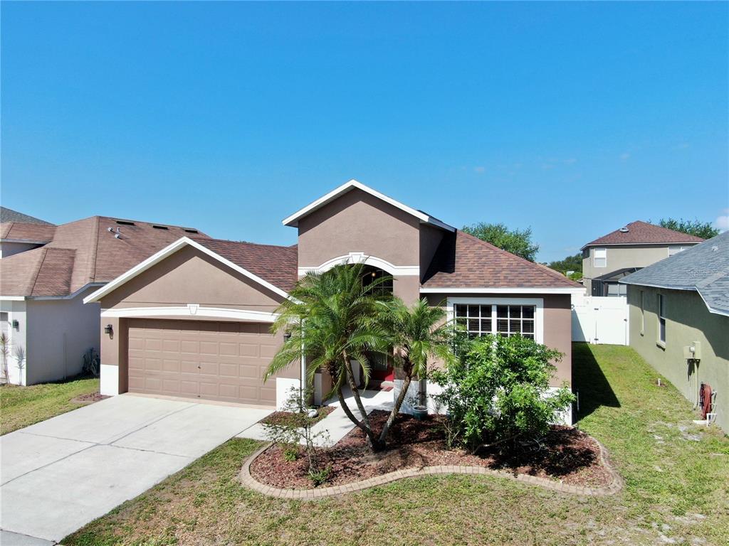 8603 Sandy Plains Drive Riverview, FL 33578 - Photo 1 of 1 a front view of a house with a yard
