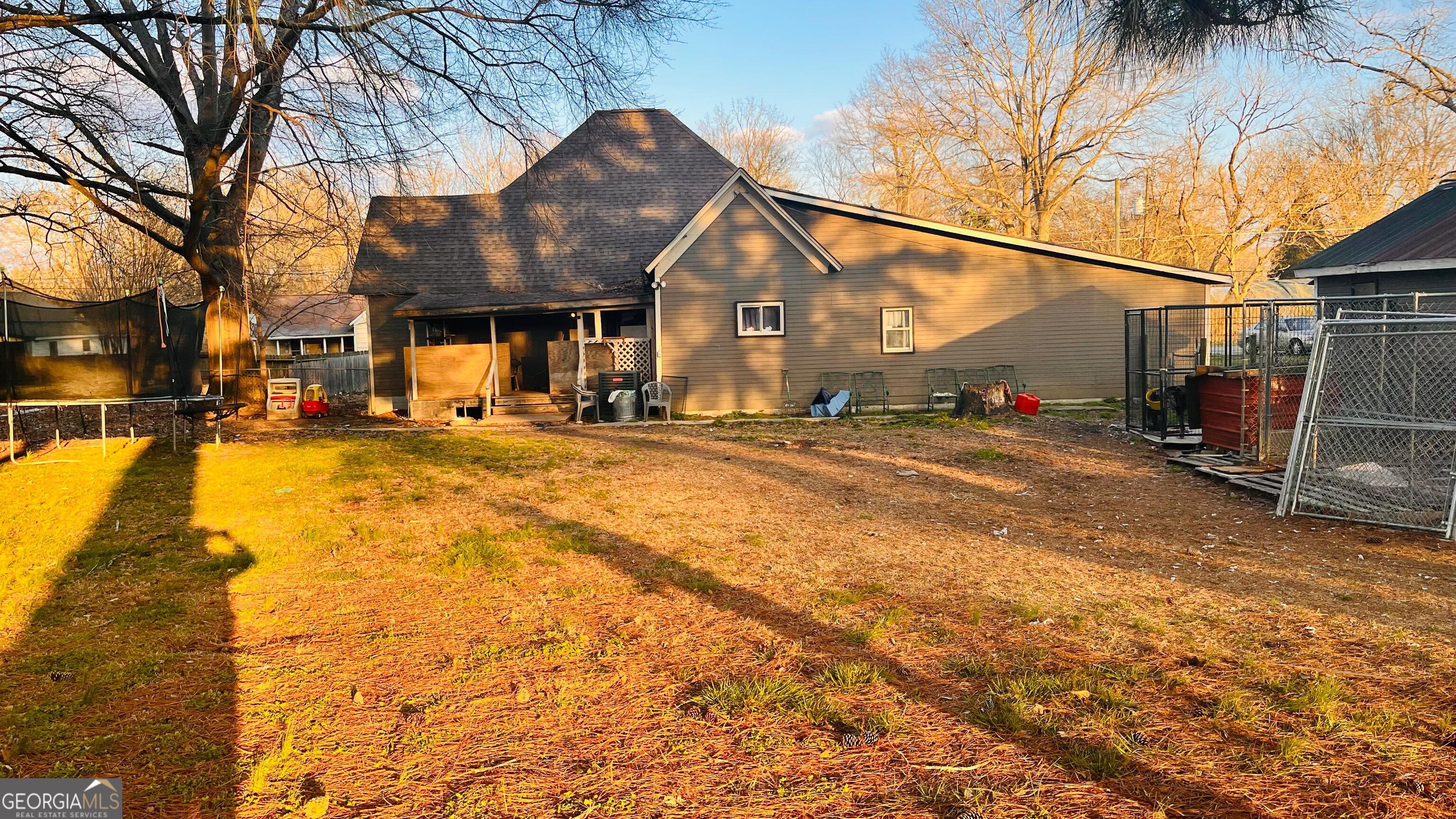 412 Magnolia Street LaFayette, GA 30728 - Photo 2 of 19 a view of a street with a building in the background