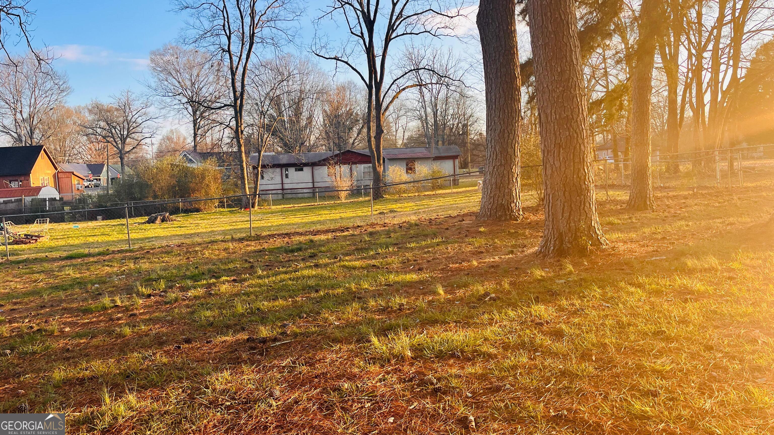 412 Magnolia Street LaFayette, GA 30728 - Photo 3 of 19 a view of water with palm trees