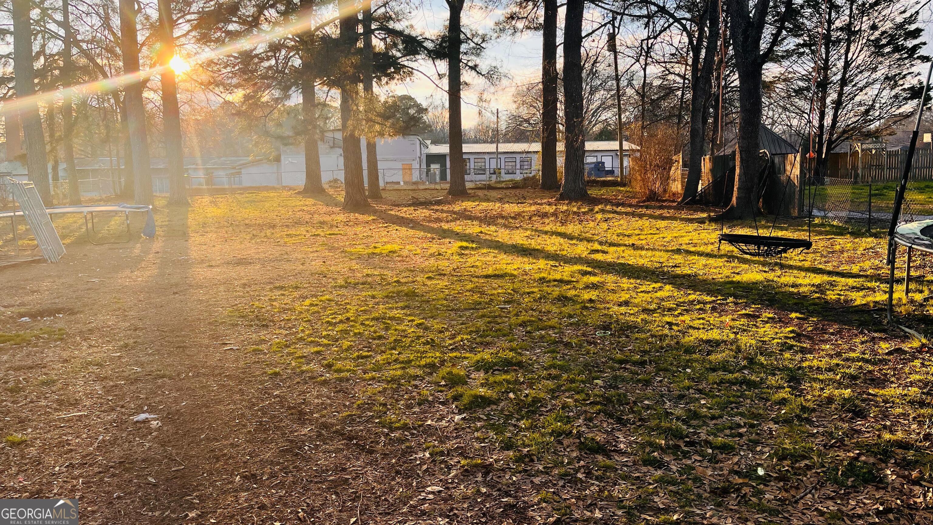 412 Magnolia Street LaFayette, GA 30728 - Photo 4 of 19 a view of road with large trees