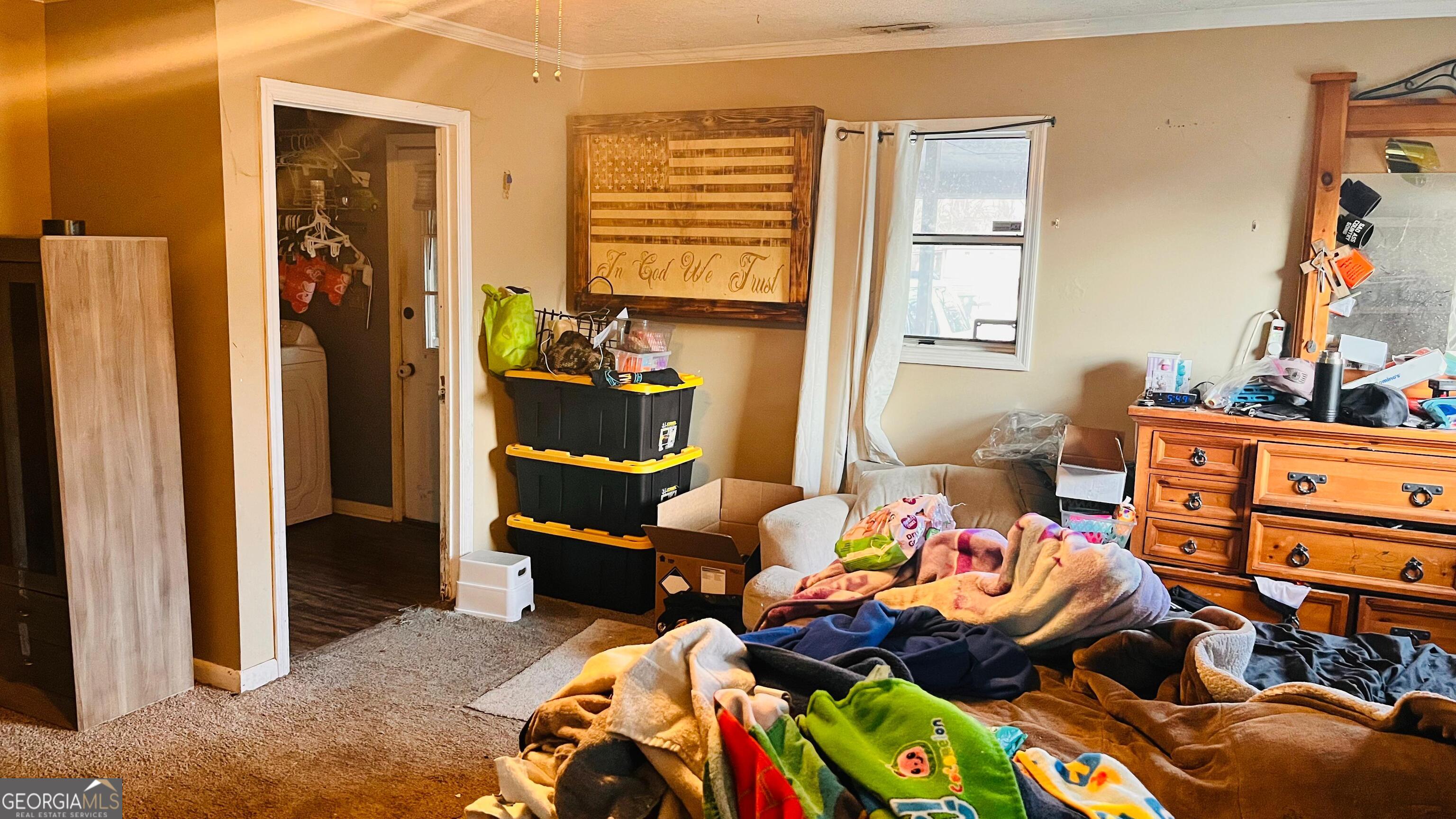 412 Magnolia Street LaFayette, GA 30728 - Photo 8 of 19 a bedroom with a bed and wooden floor