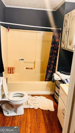 a bathroom with a sink and a toilet