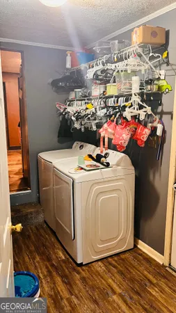 a utility room with washer and dryer