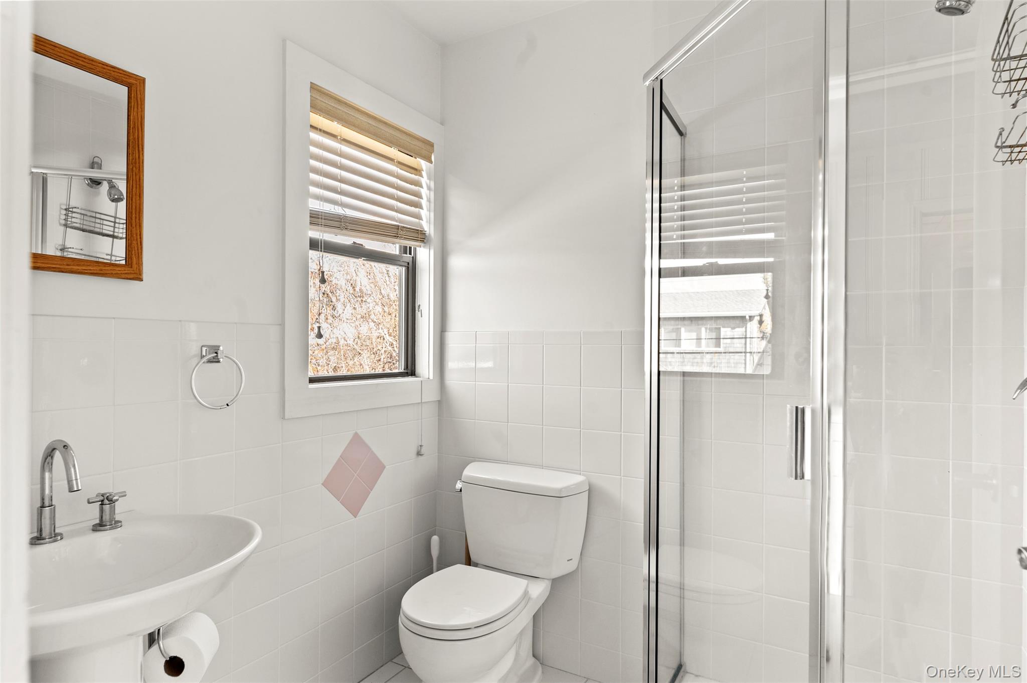 35 Sloop Walk Ocean Beach, NY 11770 - Photo 15 of 21 a white toilet sitting next to a bathroom sink