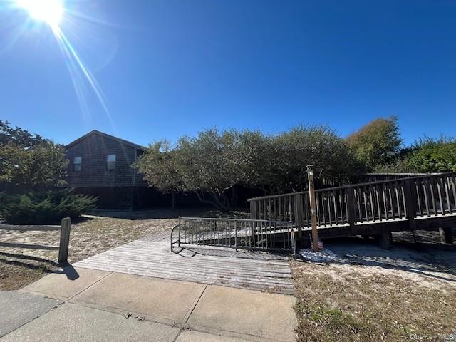 35 Sloop Walk Ocean Beach, NY 11770 - Photo 2 of 21 View of property's community featuring a wooden deck