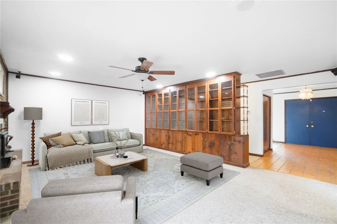 14333 Meranda Road Anna, OH 45302 - Photo 21 of 98 This inviting living area boasts a built-in bookcase and a warm, welcoming ambiance.
