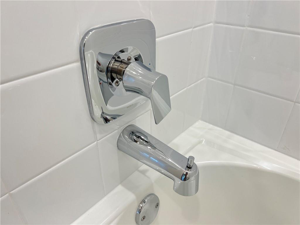 10600 Defender Trail Austin, TX 78754 - Photo 14 of 21 Bathroom view of a tub and a shower