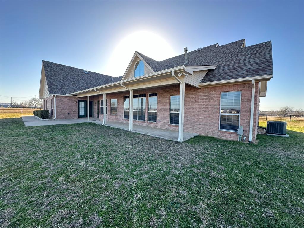 8324-c R 1006 C R 1006 Godley, TX 76044 - Photo 20 of 23 a view of a house with backyard