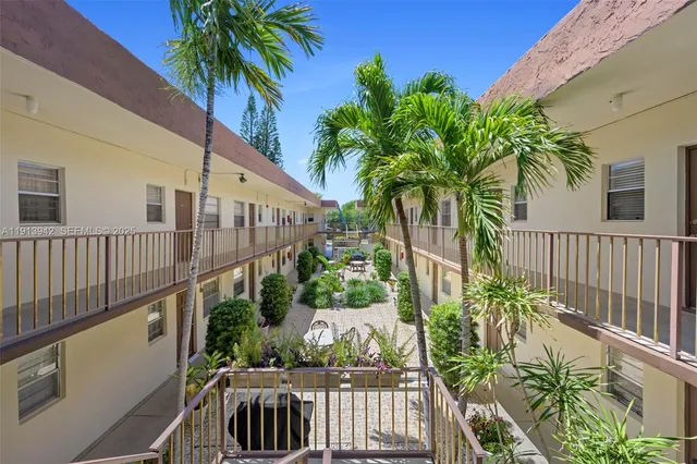 a view of street from balcony