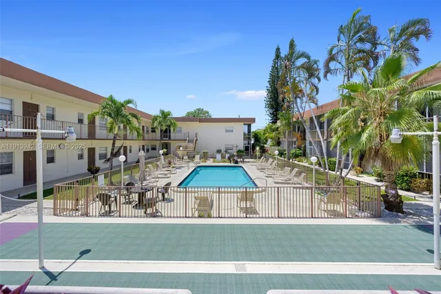 a view of a water fountain in front of building