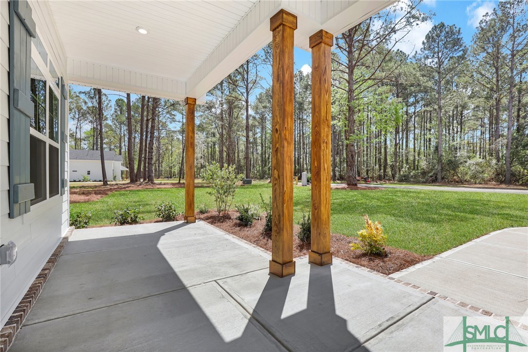 3451 Courthouse Road Guyton, GA 31312 - Photo 2 of 41 FRONT PORCH. THE SAVANNAH PLAN BY LAWRENCE ALEXAND