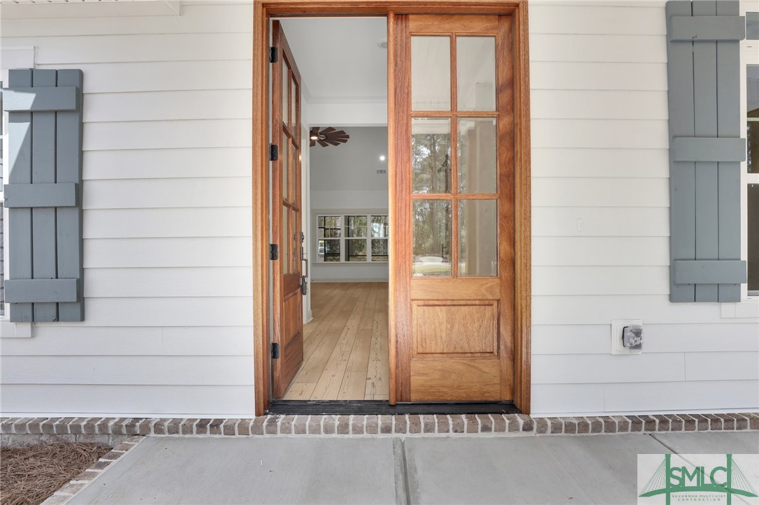 3451 Courthouse Road Guyton, GA 31312 - Photo 3 of 41 FRONT PORCH. THE SAVANNAH PLAN BY LAWRENCE ALEXAND