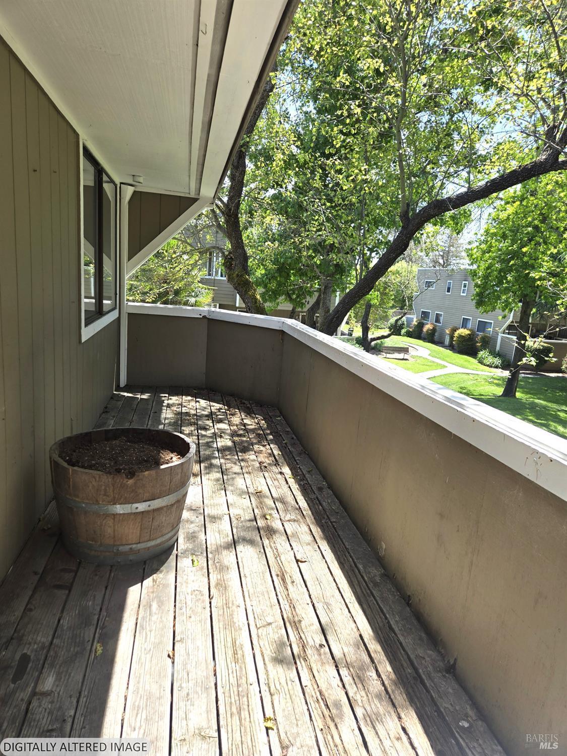 2125 West Steele Lane Santa Rosa, CA 95403 - Photo 12 of 16 a view of balcony with wooden floor