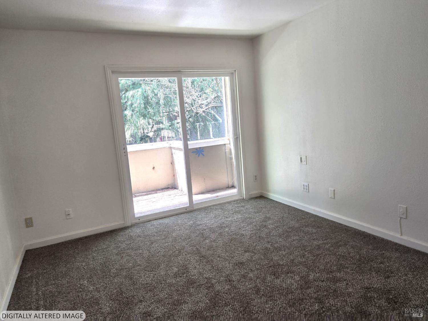 2125 West Steele Lane Santa Rosa, CA 95403 - Photo 7 of 16 an empty room with a window