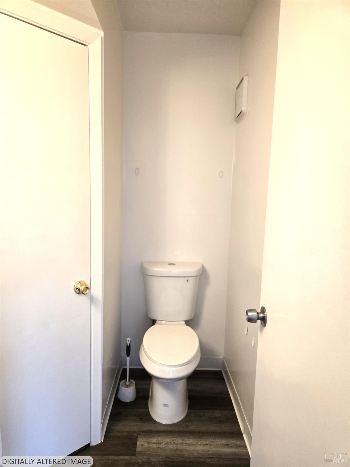 2125 West Steele Lane Santa Rosa, CA 95403 - Photo 10 of 16 a bathroom with a toilet