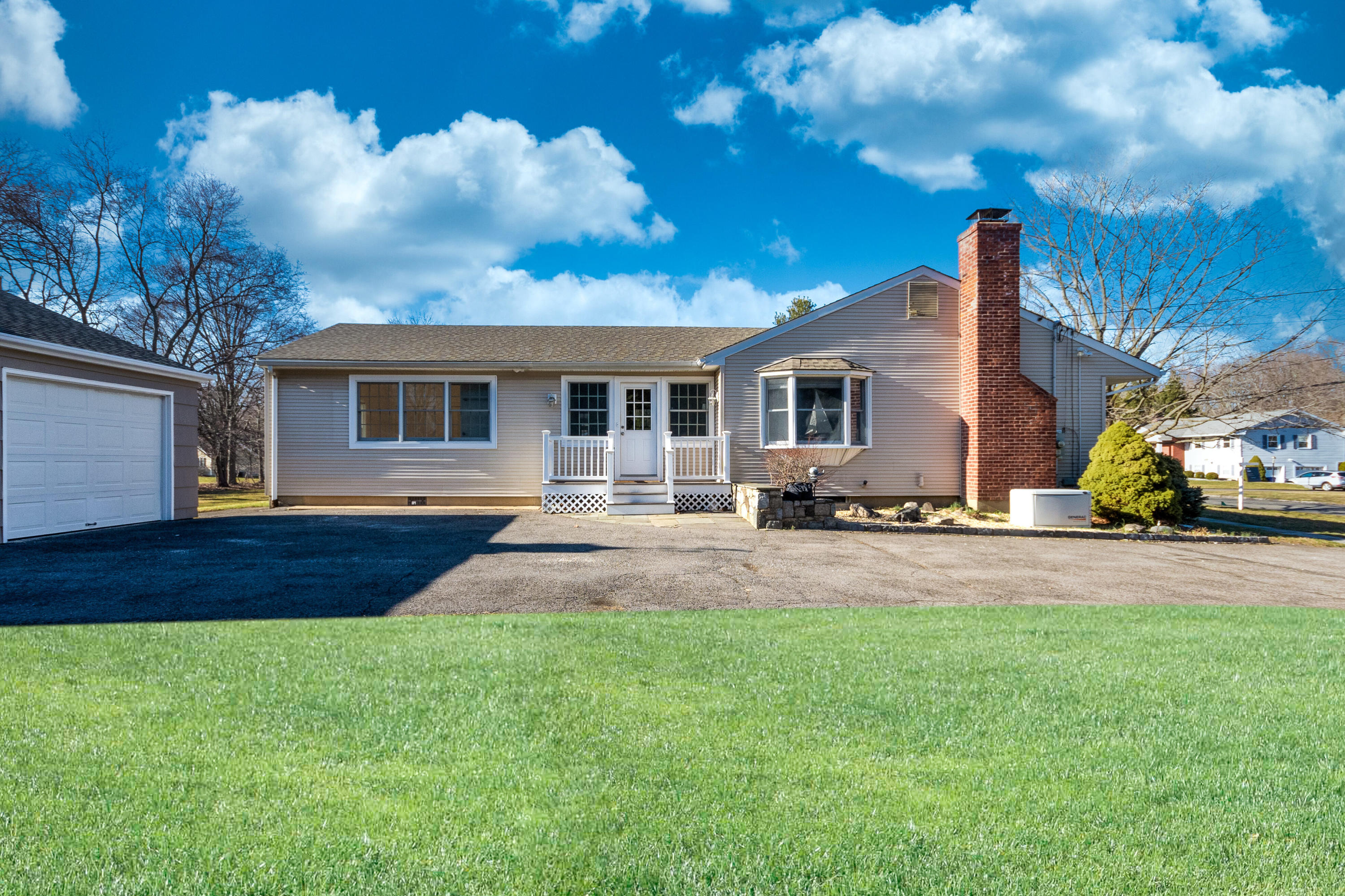 11 Cottontail Road Norwalk, CT 06854 - Photo 3 of 51 a front view of house with yard and green space