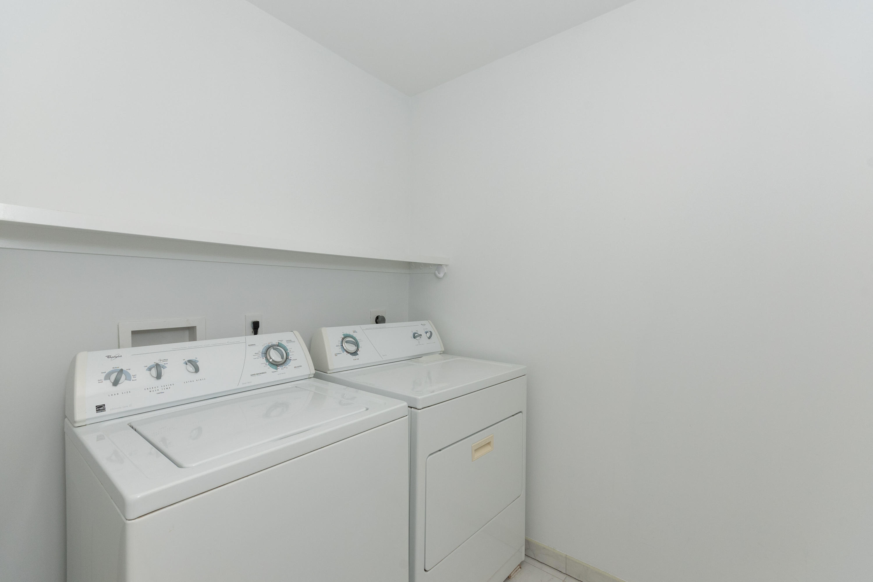 11 Cottontail Road Norwalk, CT 06854 - Photo 22 of 51 a utility room with dryer and washer