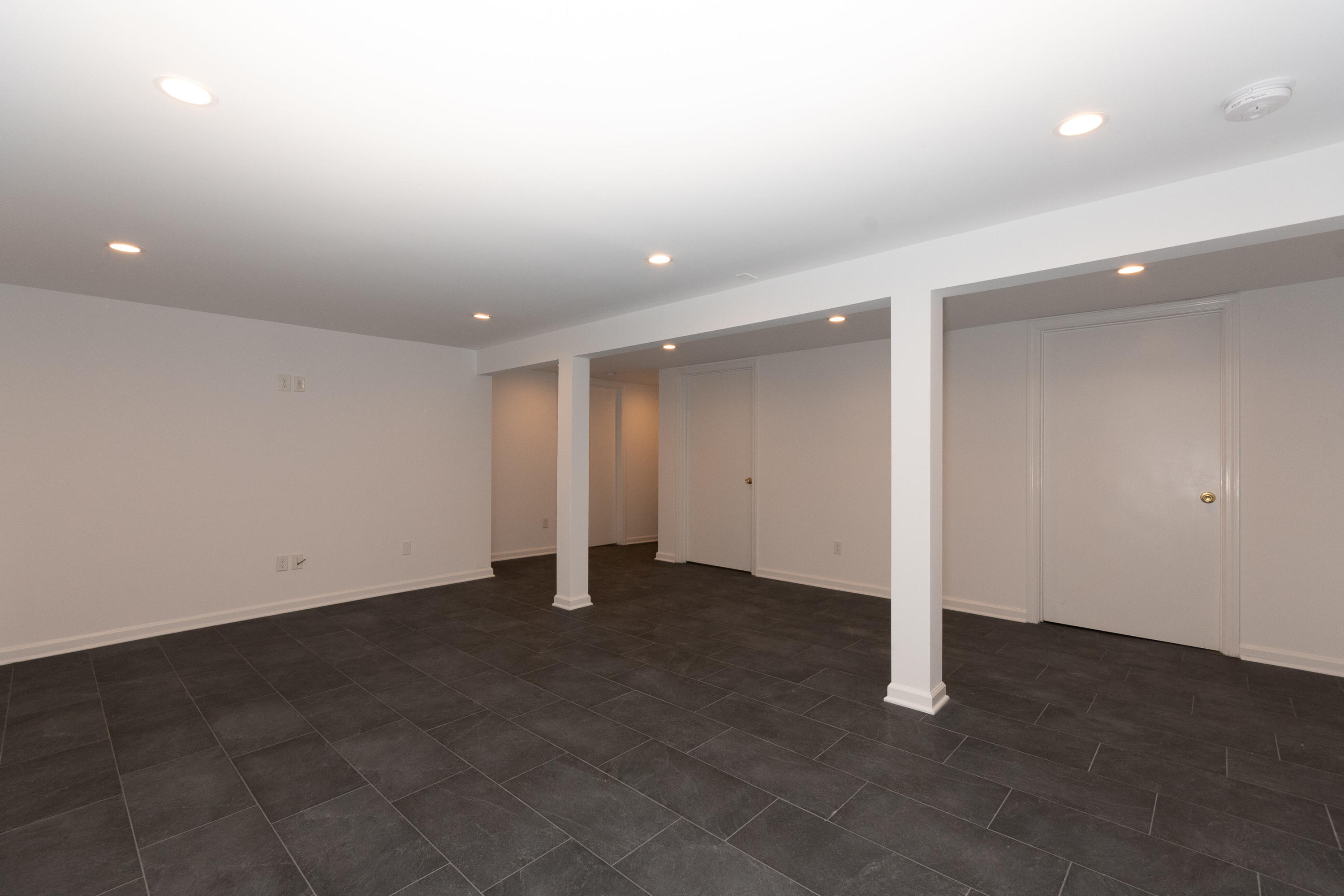 11 Cottontail Road Norwalk, CT 06854 - Photo 37 of 51 an empty room with a door