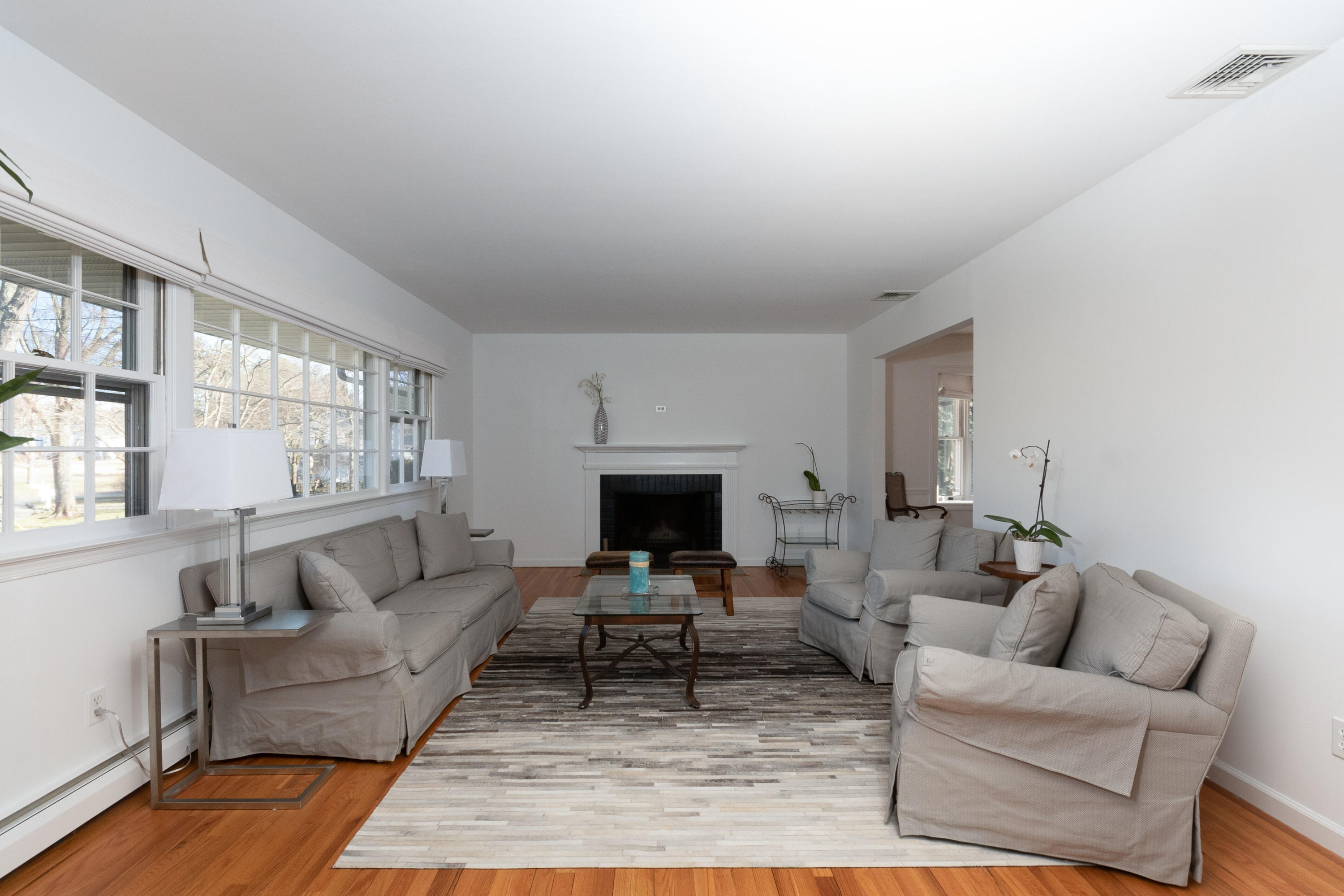 11 Cottontail Road Norwalk, CT 06854 - Photo 6 of 51 a living room with furniture and a fireplace