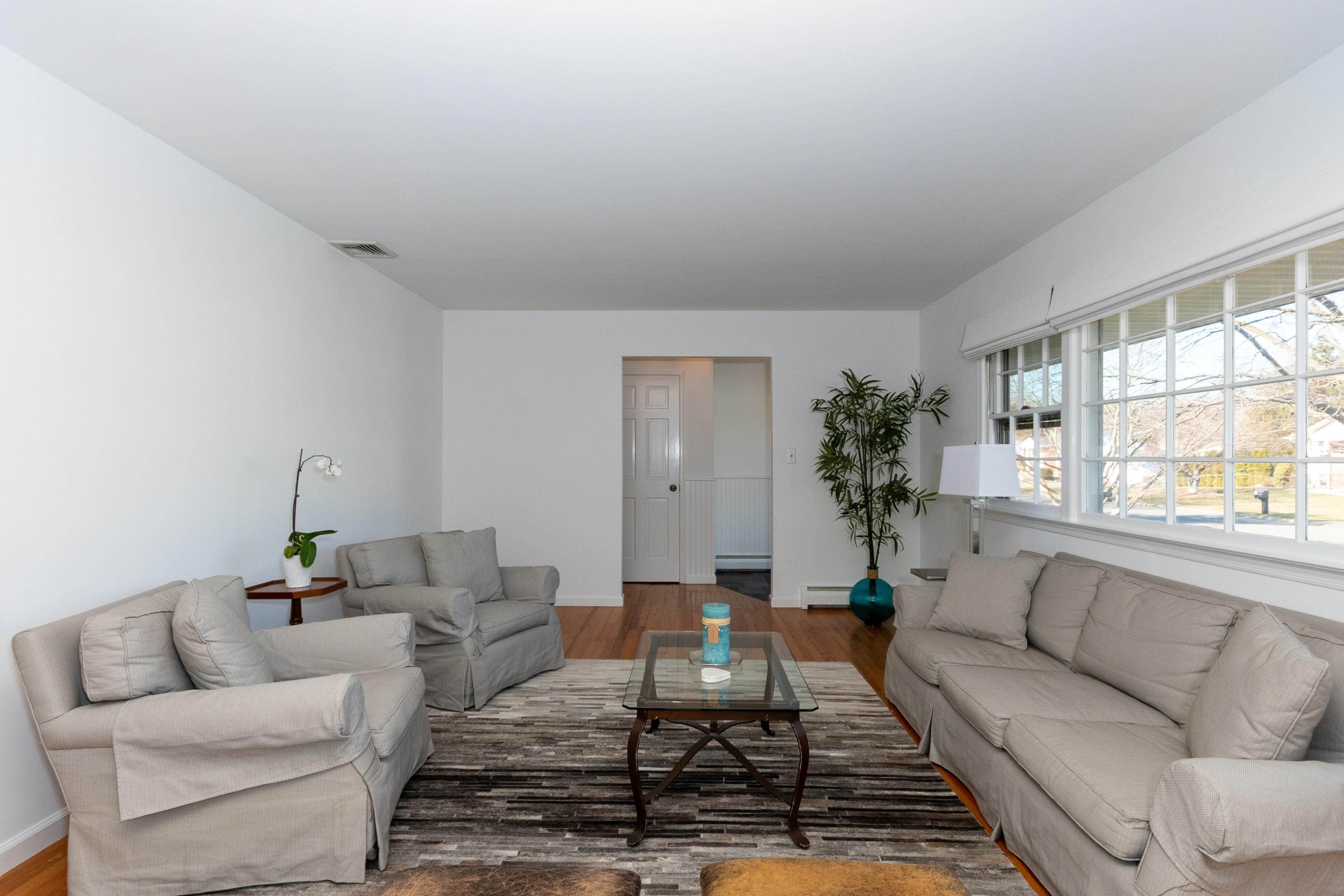 11 Cottontail Road Norwalk, CT 06854 - Photo 9 of 51 a living room with furniture and a large window