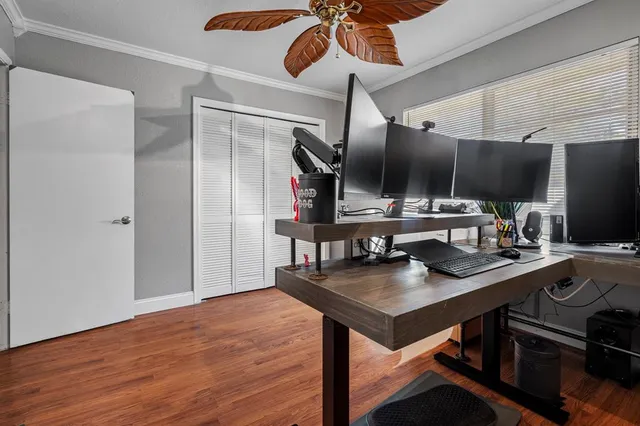 a kitchen with a table and chairs