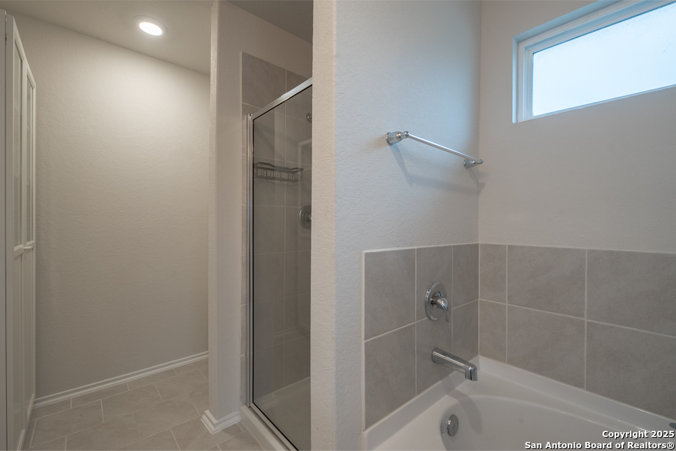 3934 Copper River Bulverde, TX 78163 - Photo 19 of 28 a bathroom with a bathtub