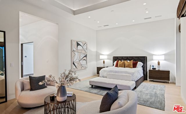 a bathroom with a tub and sink