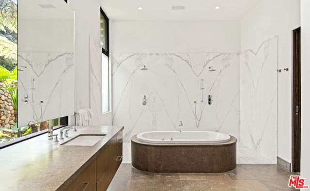 a living room with patio furniture