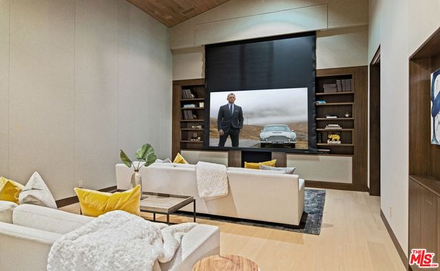 a view of swimming pool with seating space