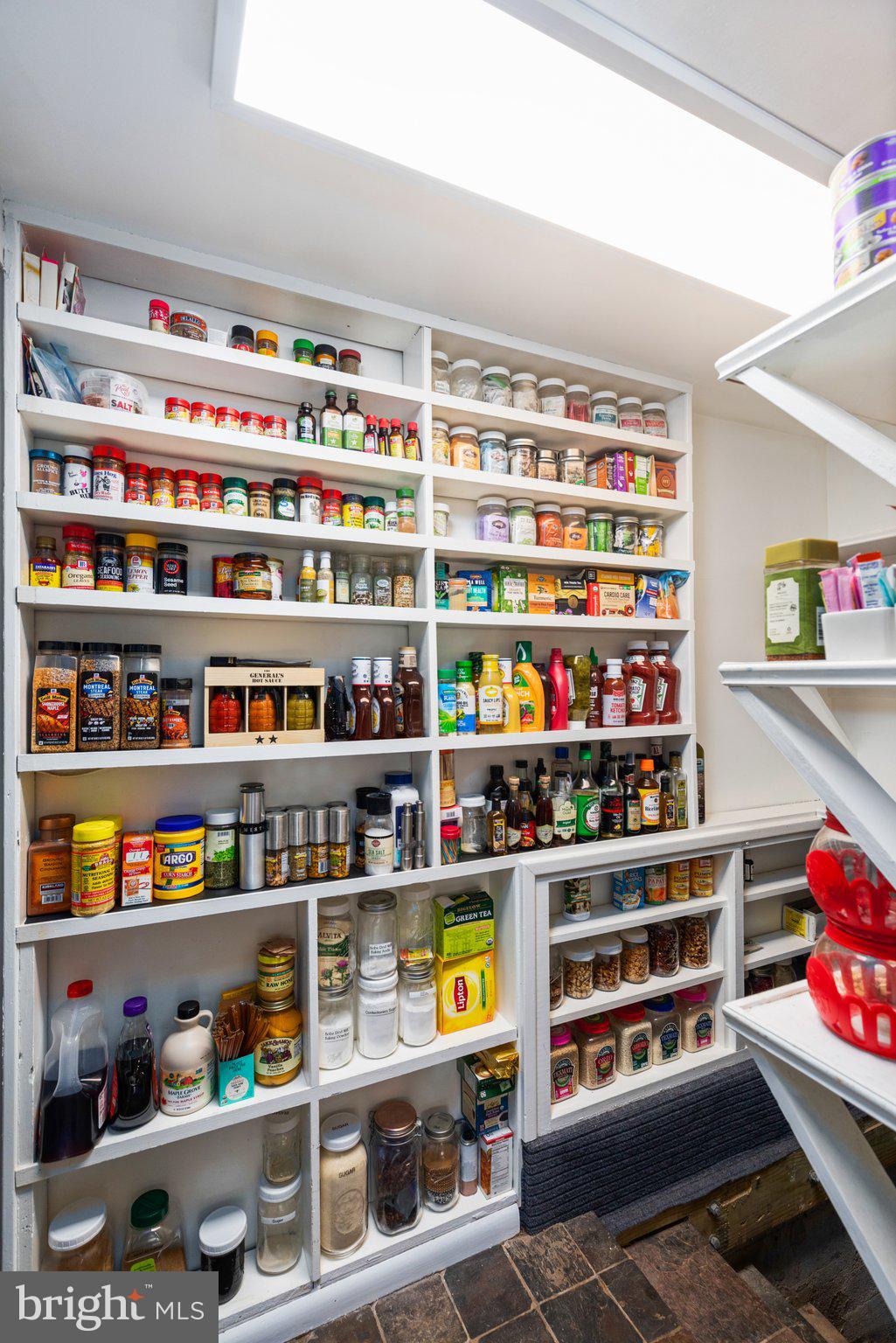 2310 Putnam Road Forest Hill, MD 21050 - Photo 54 of 90 Organized pantry with vibrant spices.