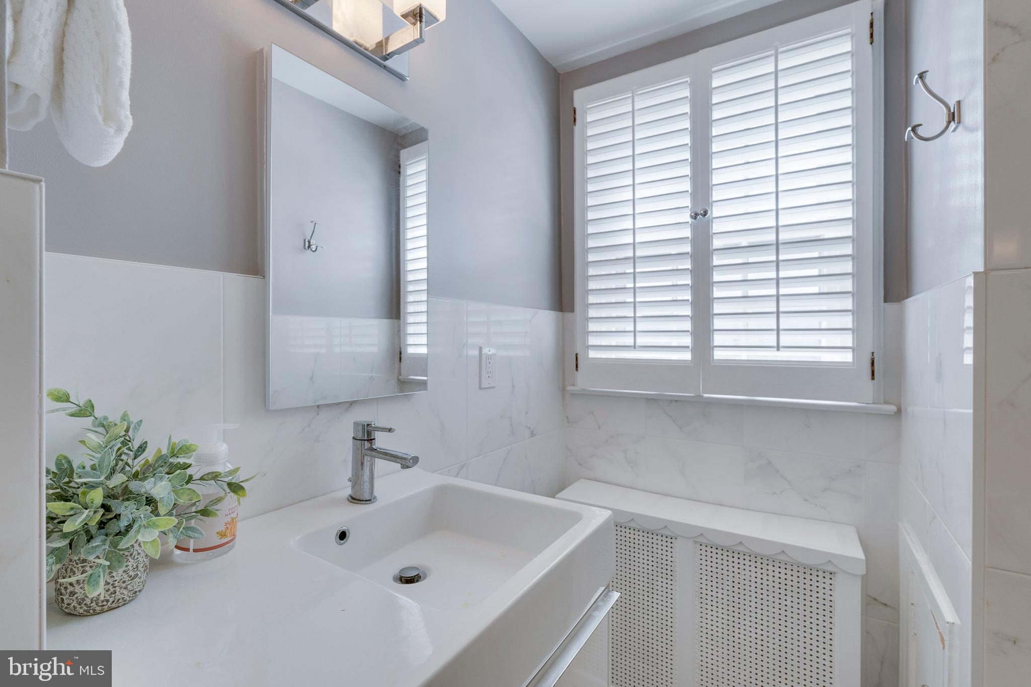 8104 Maple Ridge Road Bethesda, MD 20814 - Photo 45 of 61 Hallway Renovated Bathroom
