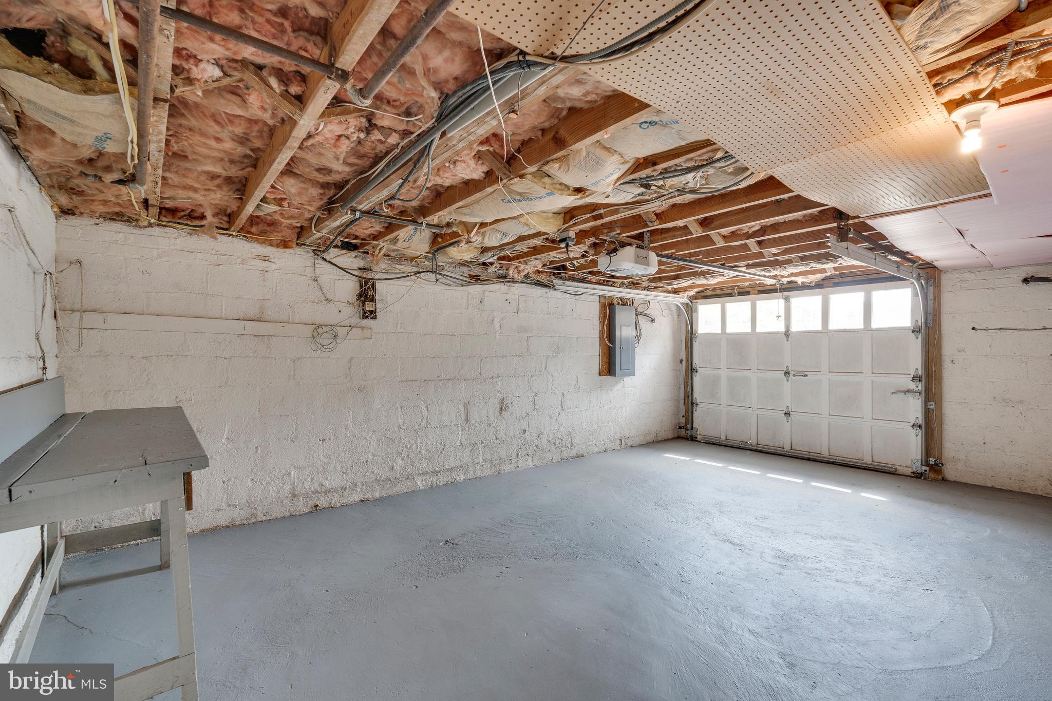 8104 Maple Ridge Road Bethesda, MD 20814 - Photo 54 of 61 One-car Garage with ample extra storage room